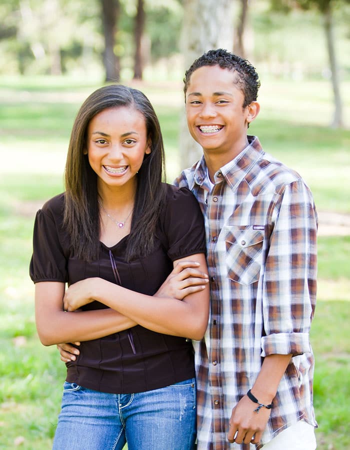 Brother and sister laughing at Greece Orthodontics & Pediatric Dentistry in Rochester, NY